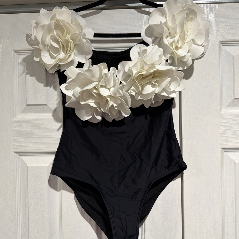Elegant Black One-Piece Swimsuit with White Floral Accents